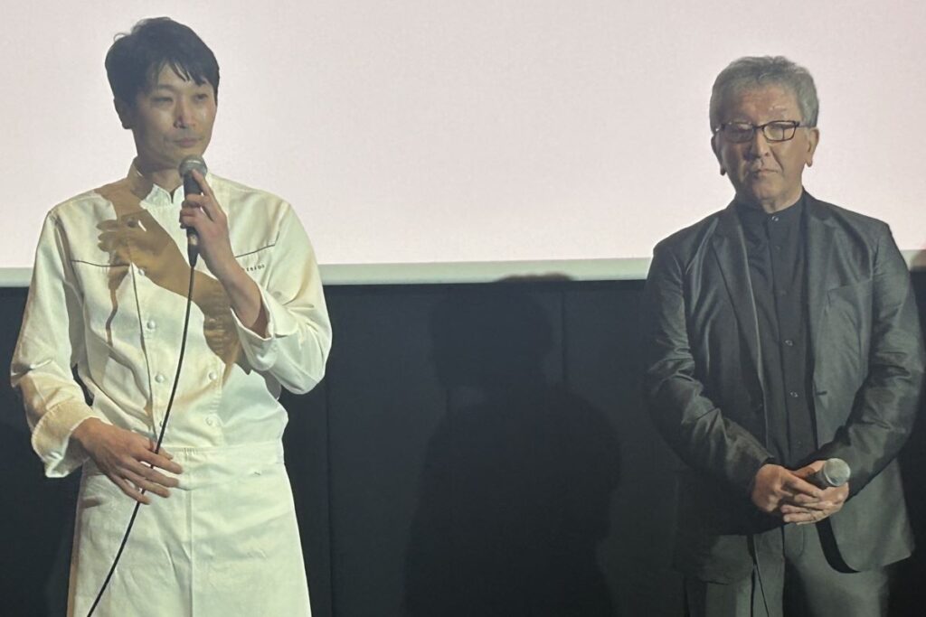 フードアドバイザーを務めた塚田宏幸さん（左）と石村のモデルになった富樫さん